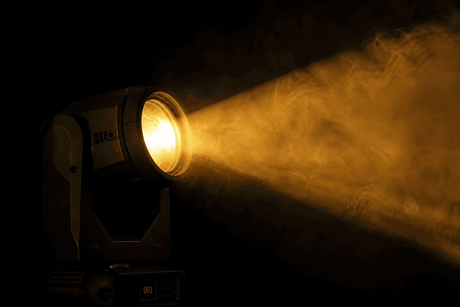 Amber stage light beam through fog